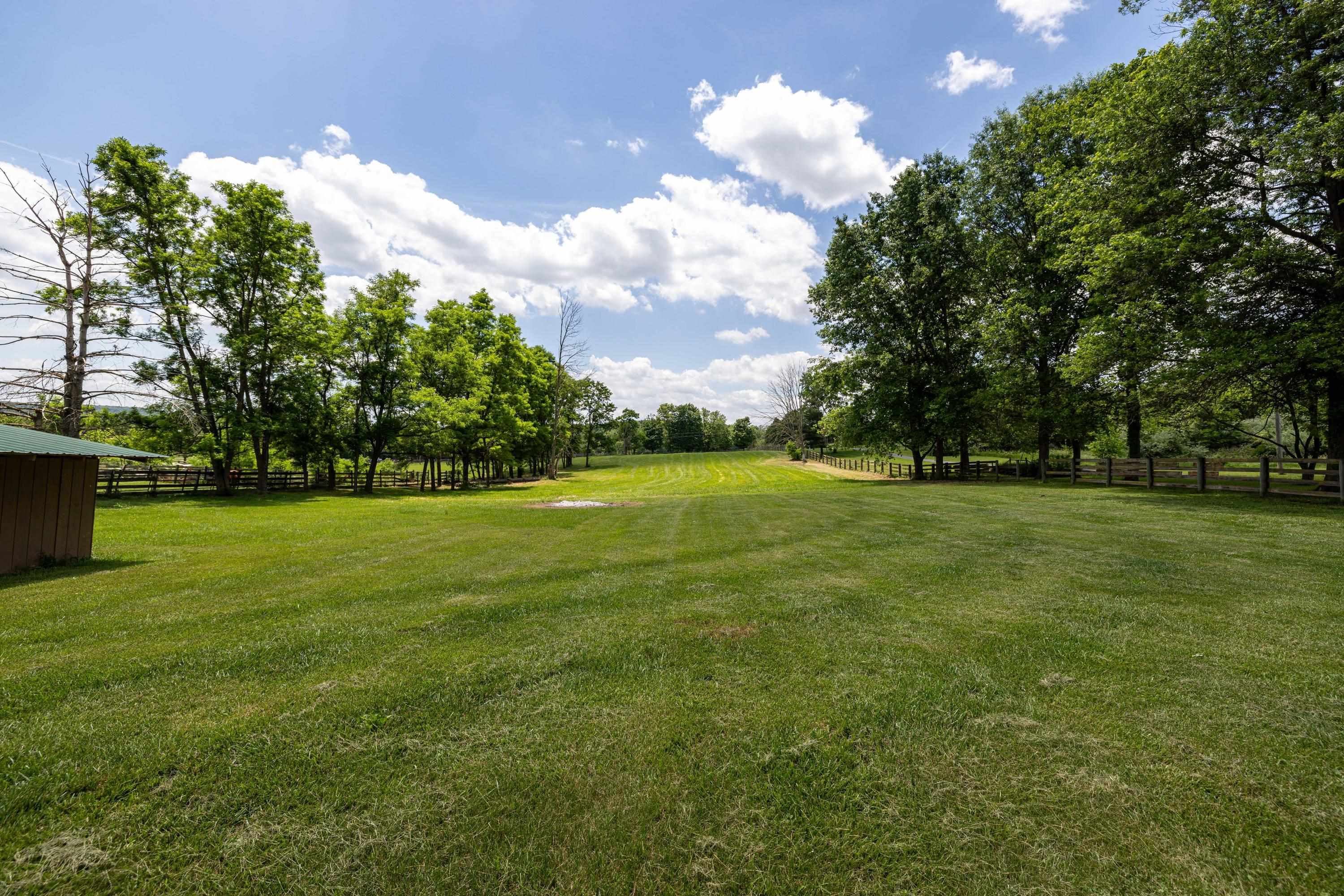 3980 Greenmount Road Harrisonburg, VA 22802 - Photo 62 of 75 The lot photos highlight the features of the wooden fence, level lot, and private surroundings of this lovely home.