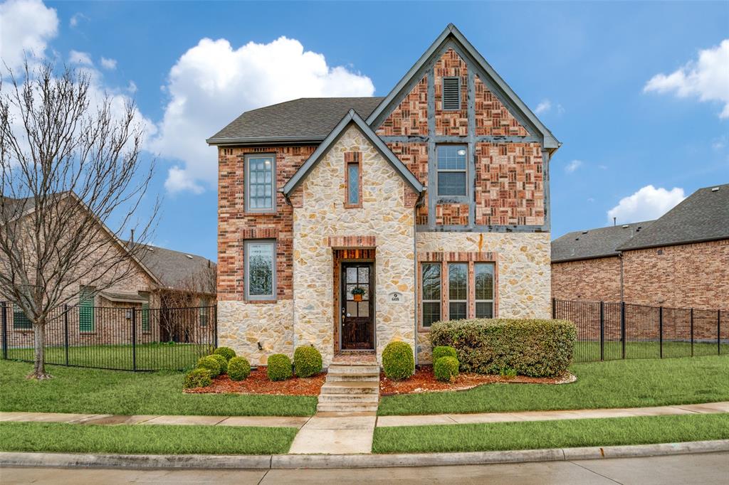 608 Arma Road Allen, TX 75002 - Photo 1 of 40 a front view of a house with garden
