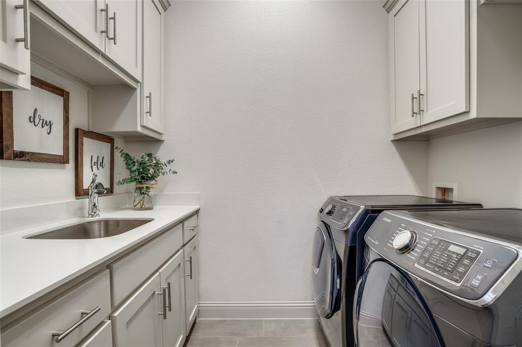 608 Arma Road Allen, TX 75002 - Photo 17 of 40 a view of utility room and sink