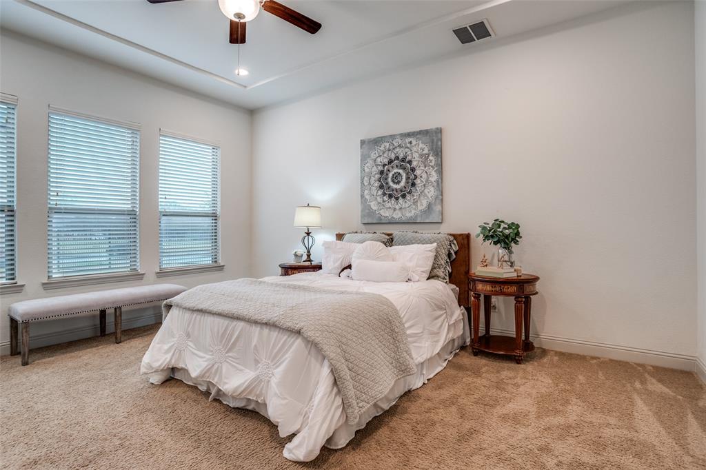 608 Arma Road Allen, TX 75002 - Photo 19 of 40 a bedroom with bed and window
