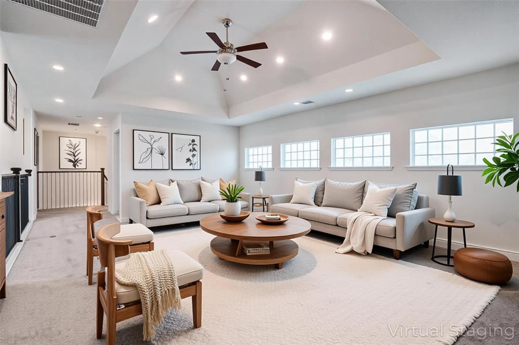 608 Arma Road Allen, TX 75002 - Photo 27 of 40 a living room with furniture kitchen view and a large window