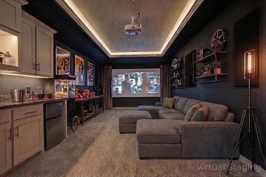 608 Arma Road Allen, TX 75002 - Photo 29 of 40 a living room with furniture and a flat screen tv