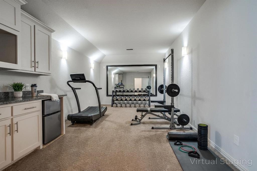 608 Arma Road Allen, TX 75002 - Photo 30 of 40 a view of a room with gym equipment