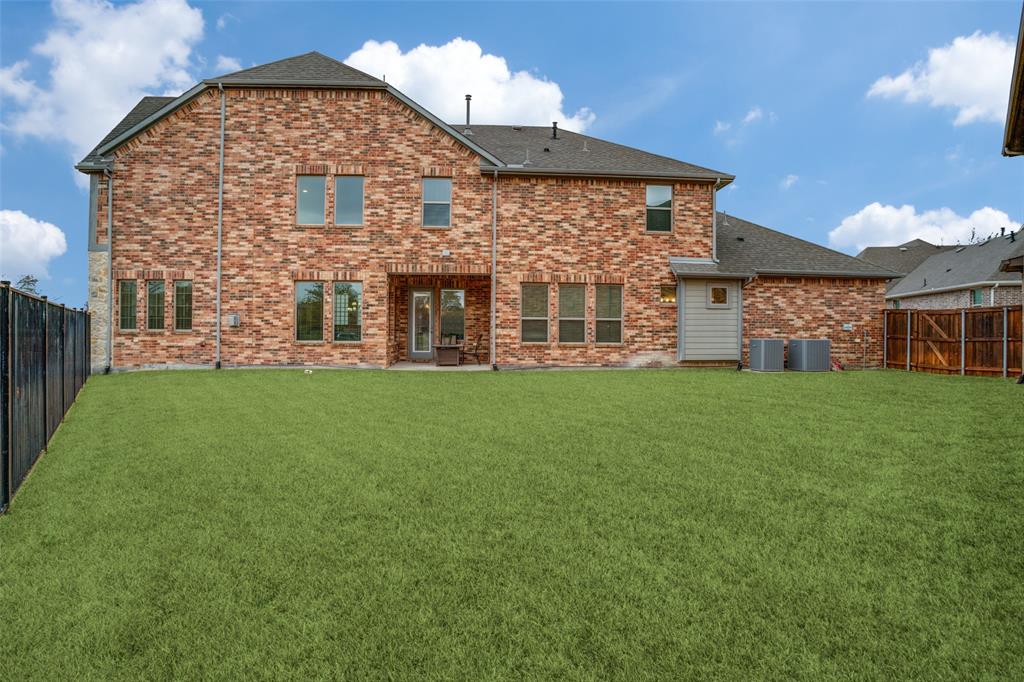 608 Arma Road Allen, TX 75002 - Photo 36 of 40 a view of a house with a yard