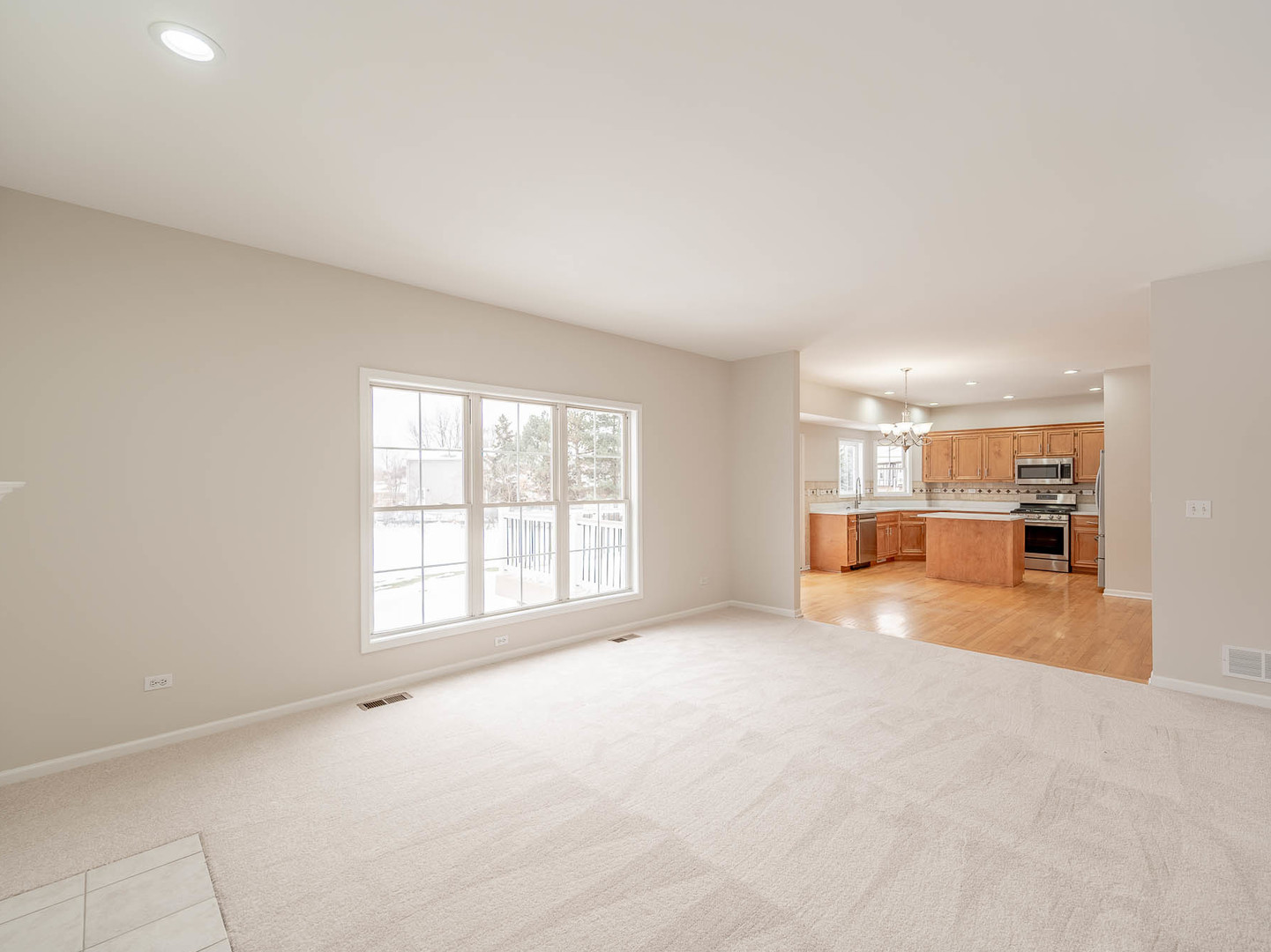 975 Merbach Court Carol Stream, IL 60188 - Photo 6 of 28 a view of an empty room with a window