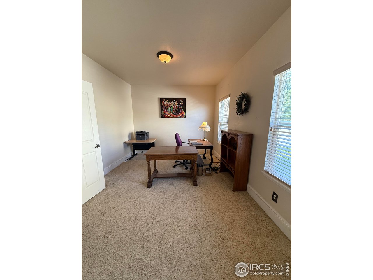3016 68th Avenue Greeley, CO 80634 - Photo 12 of 21 Main level bedroom