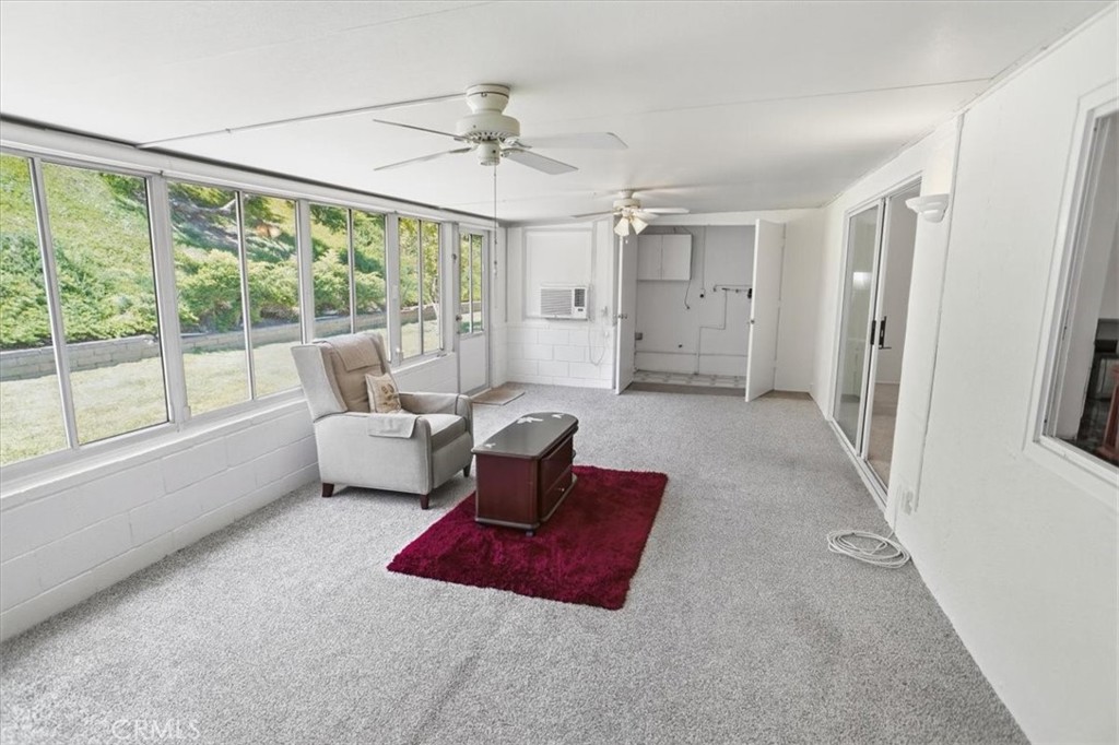 19427 Oak Crossing Road Newhall, CA 91321 - Photo 12 of 45 a living room with furniture and a large window