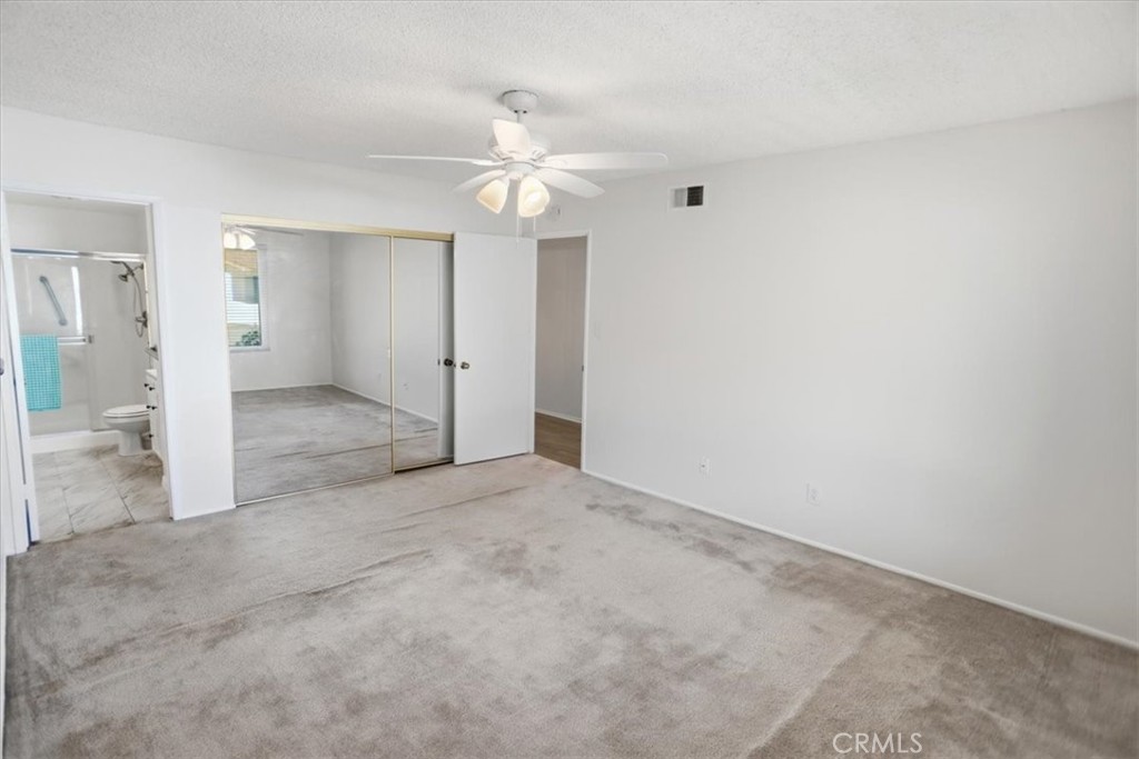 19427 Oak Crossing Road Newhall, CA 91321 - Photo 15 of 45 an empty room with a bathroom