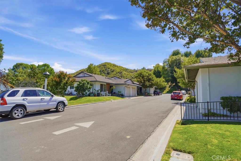 19427 Oak Crossing Road Newhall, CA 91321 - Photo 20 of 45 a view of street with parked cars