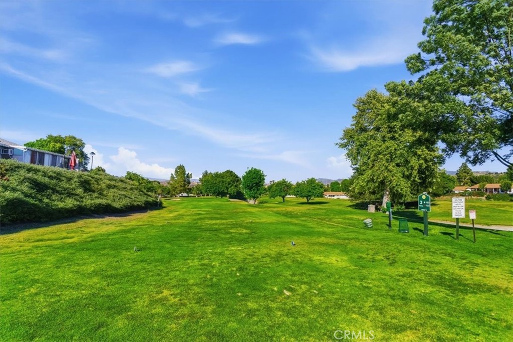 19427 Oak Crossing Road Newhall, CA 91321 - Photo 28 of 45 a view of a grassy field with trees