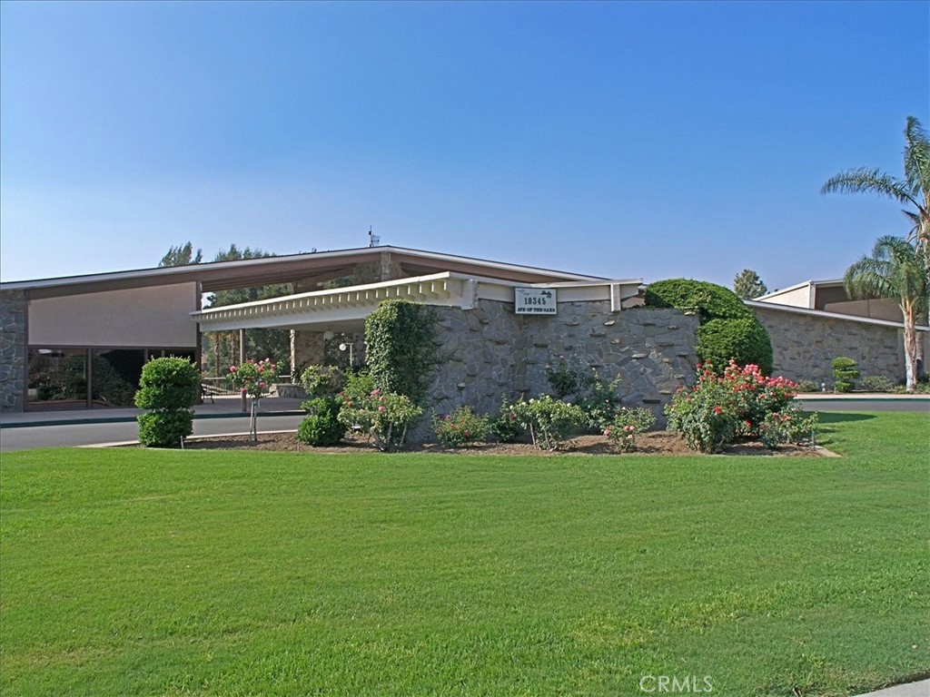 19427 Oak Crossing Road Newhall, CA 91321 - Photo 31 of 45 a view of a house with backyard sitting area and garden