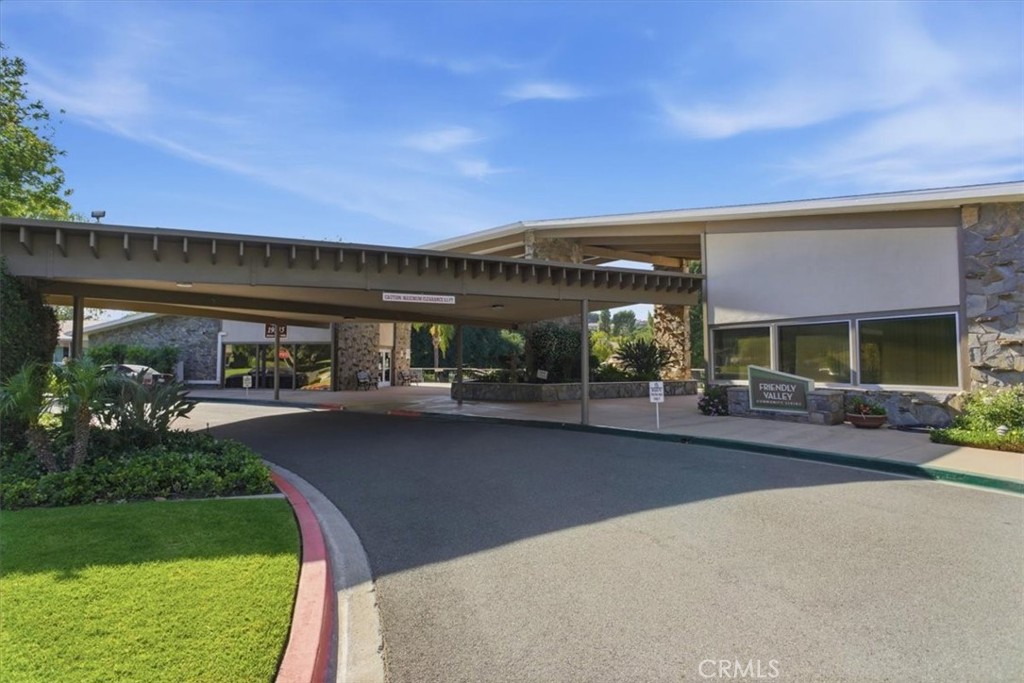 19427 Oak Crossing Road Newhall, CA 91321 - Photo 32 of 45 a front view of a house with garden