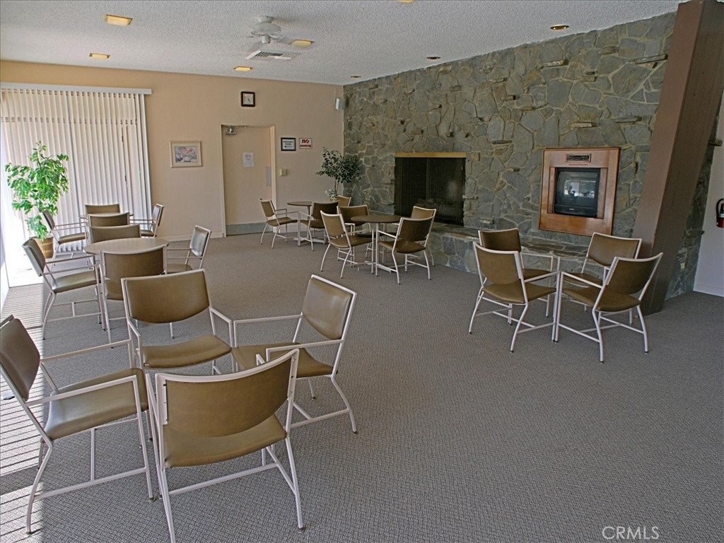 19427 Oak Crossing Road Newhall, CA 91321 - Photo 38 of 45 a dining room with furniture and wooden floor