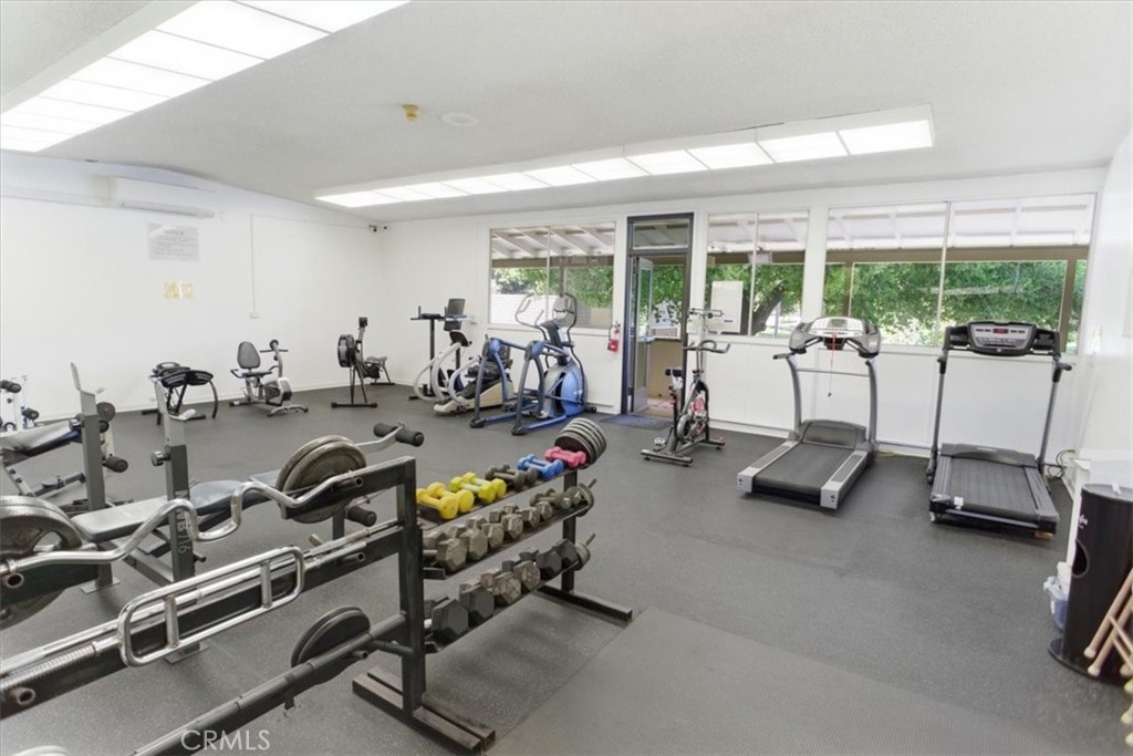 19427 Oak Crossing Road Newhall, CA 91321 - Photo 39 of 45 a view of a room with gym equipment