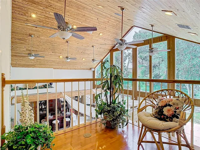 a bed room with furniture and a window