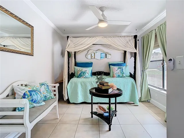 a view of a hallway with wooden floor and entryway