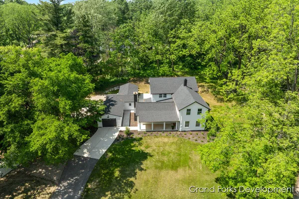 $874,900 | 101 Carl Drive Northeast, Ada, MI 49301