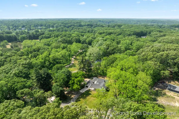 $874,900 | 101 Carl Drive Northeast, Ada, MI 49301