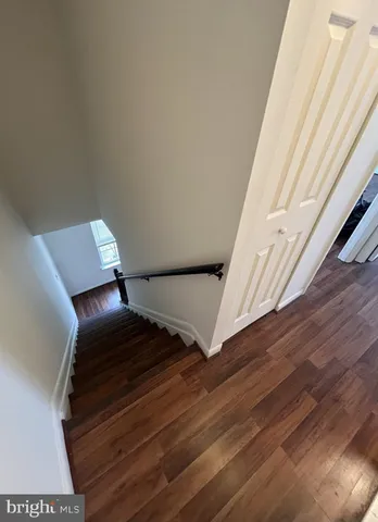 a view of entryway with wooden floor