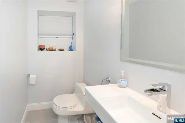 a bathroom with a sink and a toilet