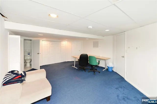 a living room with furniture and a couch