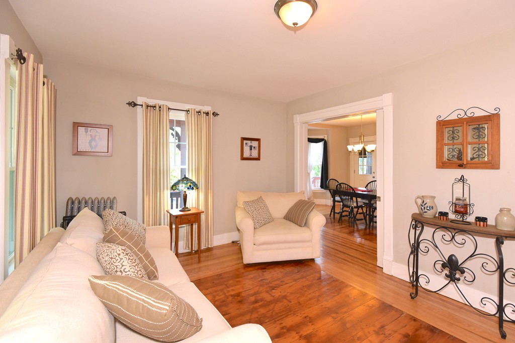 7 Chadwick Street Worcester, MA 01605 - Photo 3 of 30 a living room with furniture and wooden floor