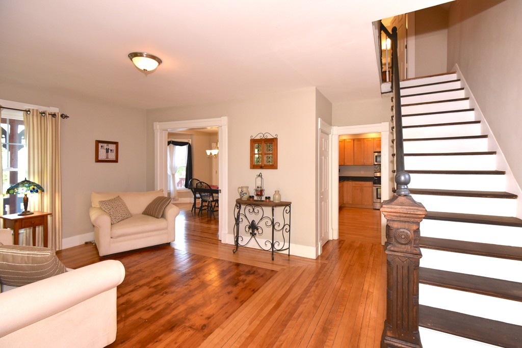 7 Chadwick Street Worcester, MA 01605 - Photo 7 of 30 a living room with furniture and wooden floor