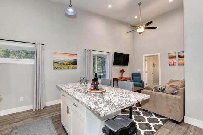 1409 Victorian Alley Sacramento, CA 95818 - Photo 27 of 45 a living room with dining table and chairs