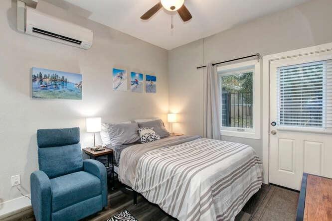 1409 Victorian Alley Sacramento, CA 95818 - Photo 41 of 45 a bedroom with bed couch and window