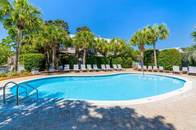 a view of swimming pool with a patio
