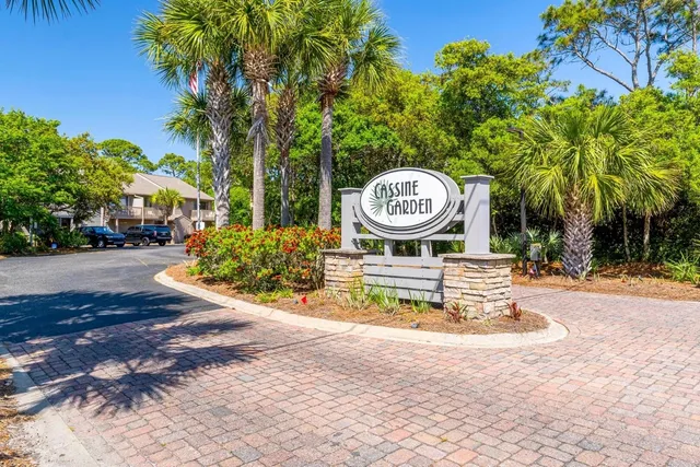 a view of a park with plants and trees