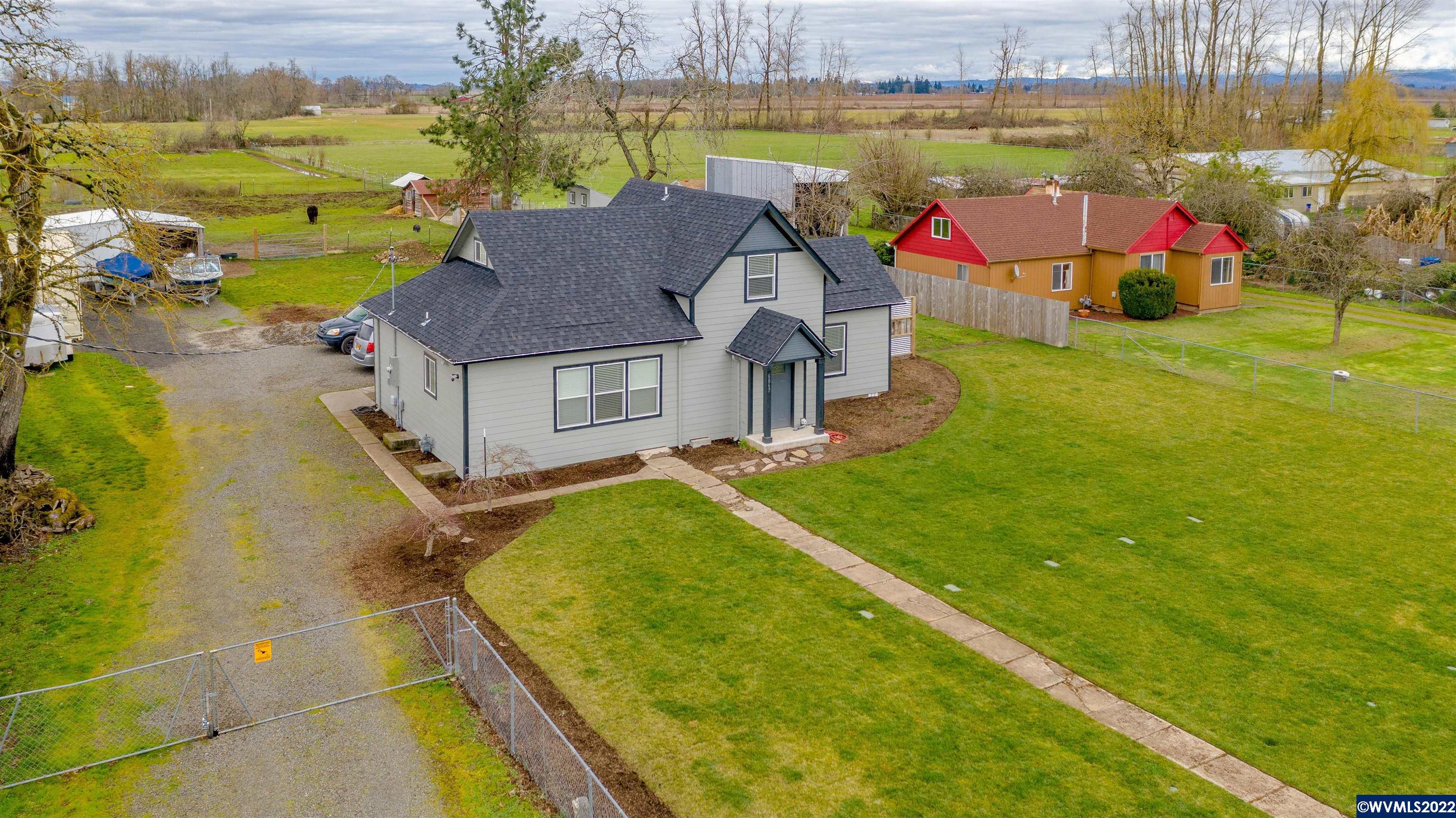 6067 Stayton Road Southeast Turner, OR 97392 - Photo 2 of 31 a view of a house with a swimming pool