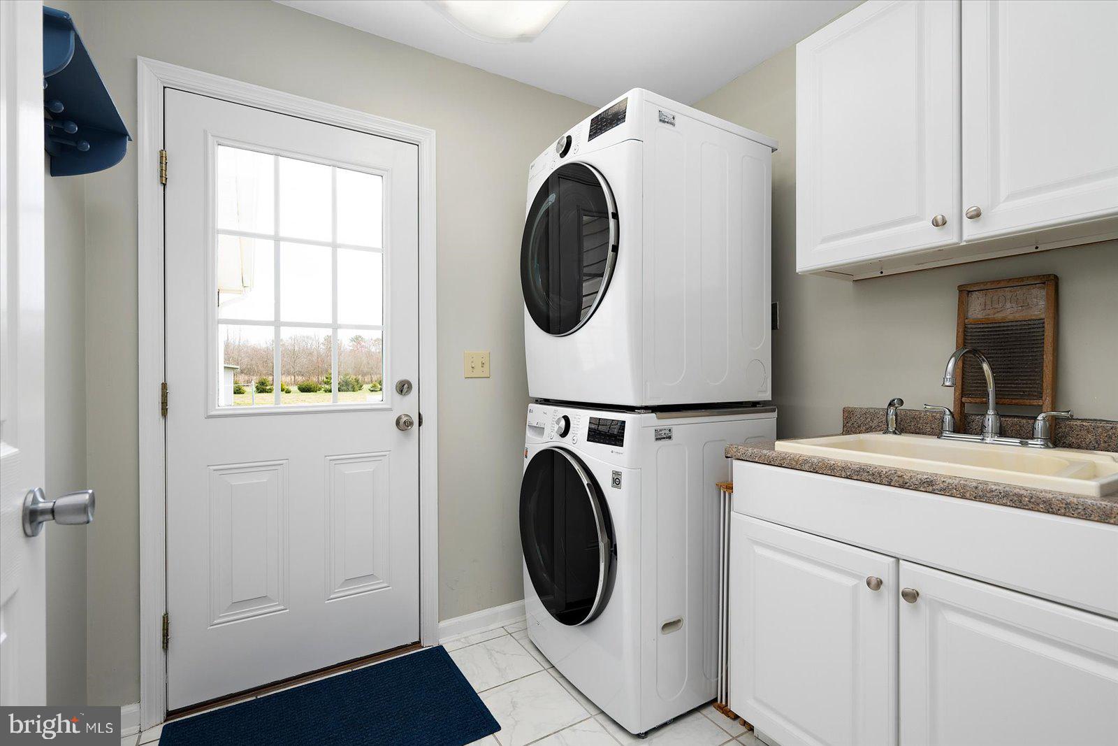 12402 Blueberry Road Whaleyville, MD 21872 - Photo 54 of 83 Laundry room with sink