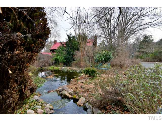 2131 Marions Ford Road Chapel Hill, NC 27516 - Photo 1 of 25 House with garden Pond.