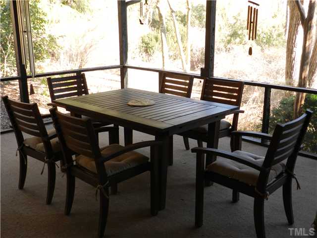 2131 Marions Ford Road Chapel Hill, NC 27516 - Photo 15 of 25 Screen porch and gathering table.