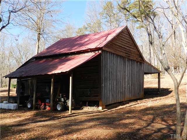 2131 Marions Ford Road Chapel Hill, NC 27516 - Photo 5 of 25 19c wing barn with hand-adzed log walls.