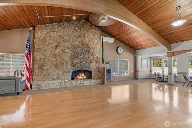 a front view of a house with sitting area