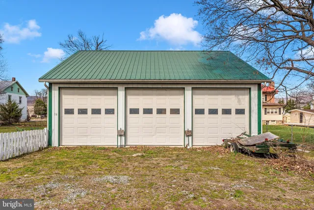 a front view of a building with street view