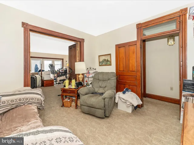 a bedroom with a bed and a walk in closet