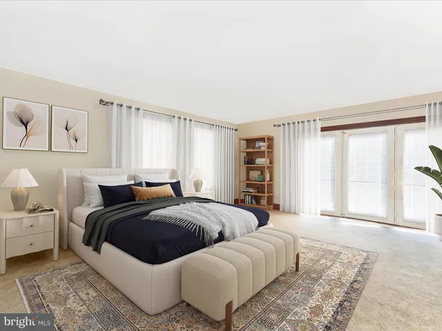 a bathroom with a sink a toilet a mirror and shower