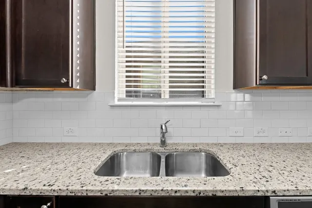 a kitchen with a stove and a microwave