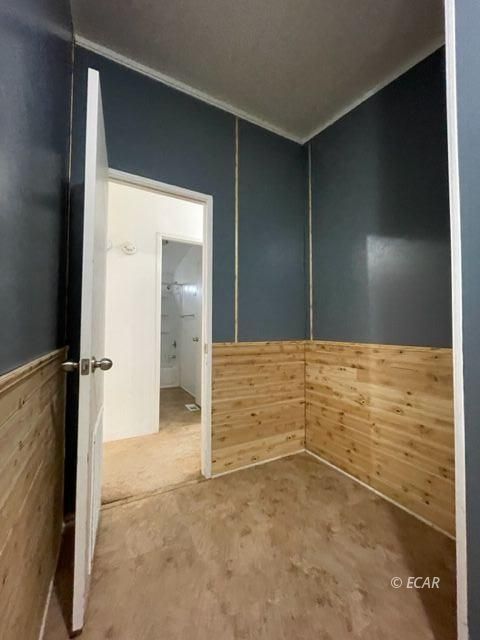473 Spring Valley Parkway Spring Creek, NV 89815 - Photo 18 of 40 a bathroom with a shower and a glass door