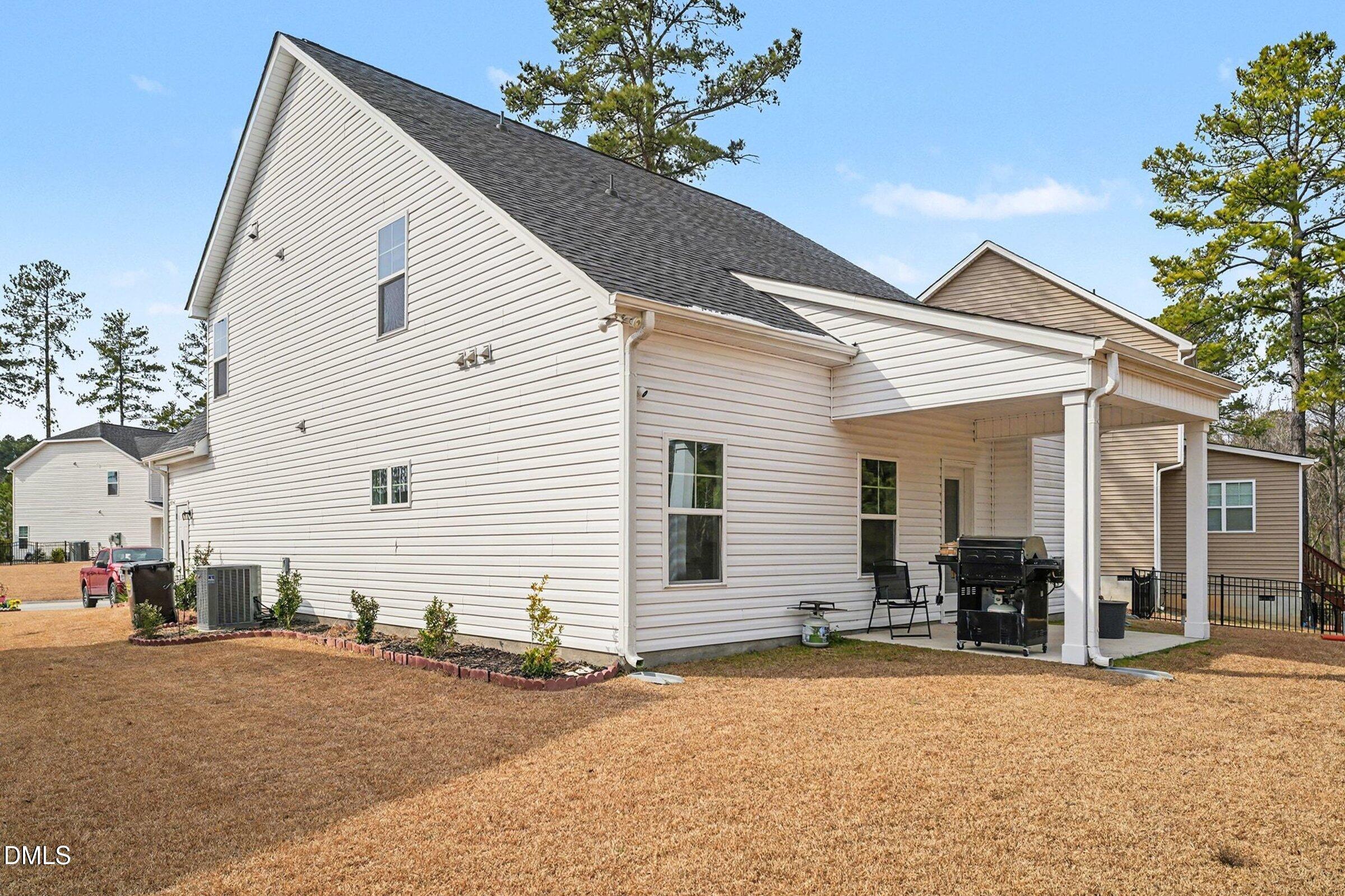 365 Timber Skip Drive Spring Lake, NC 28390 - Photo 31 of 33 a view of a house with a patio
