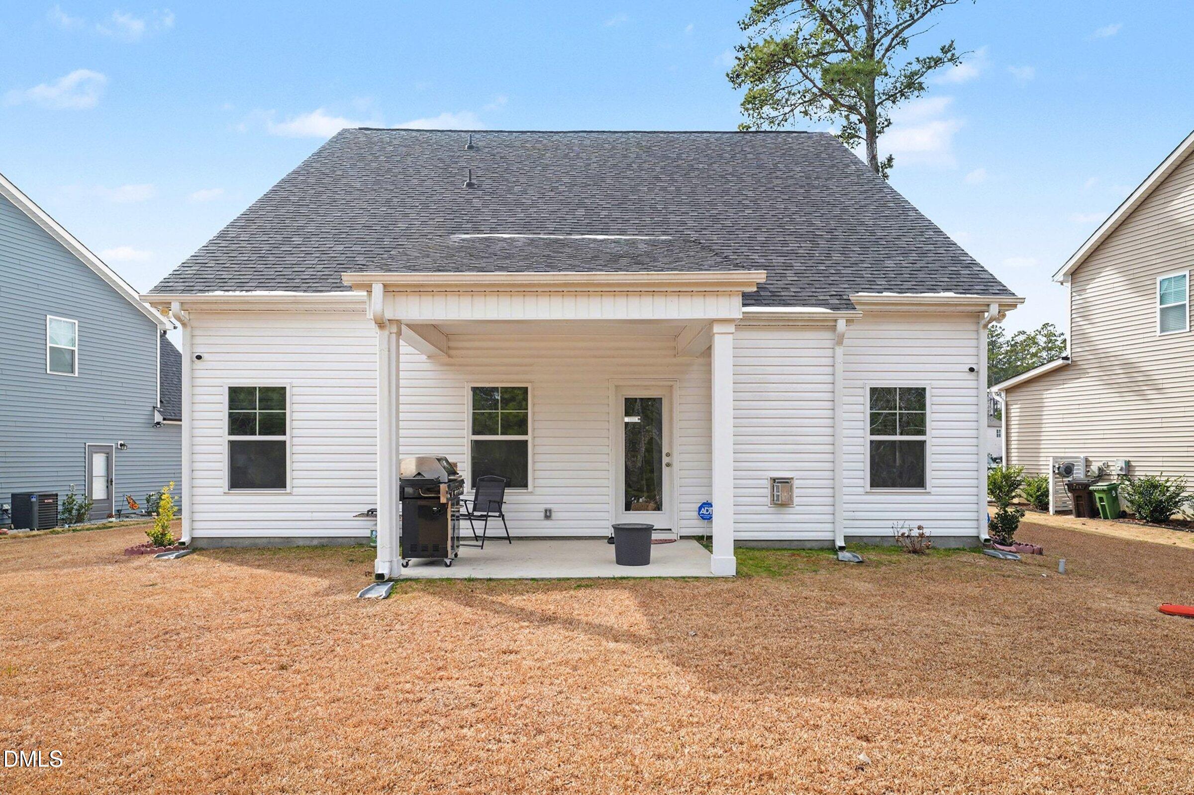 365 Timber Skip Drive Spring Lake, NC 28390 - Photo 33 of 33 a house view with a outdoor space