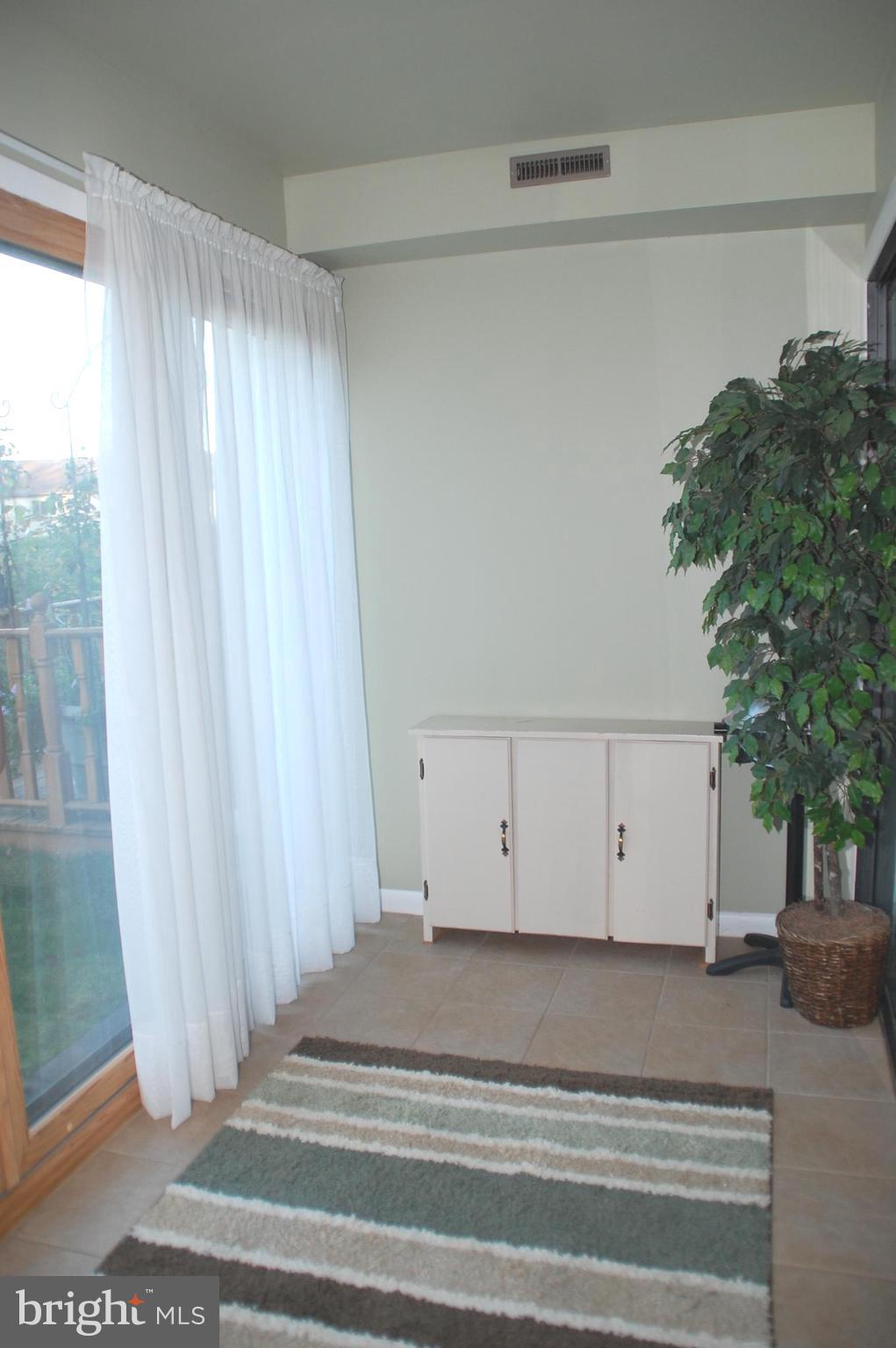 12 Centennial Road Telford, PA 18969 - Photo 14 of 35 the wonderful Solarium w/access to back courtyard.