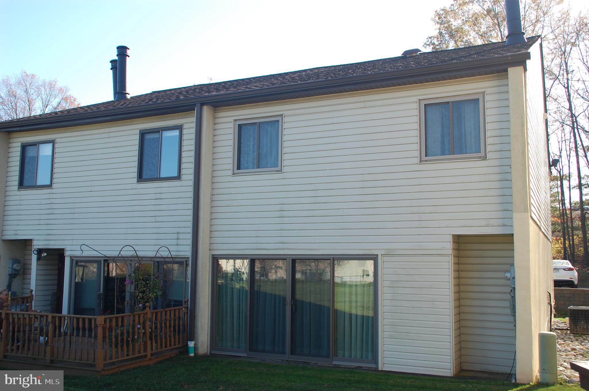 12 Centennial Road Telford, PA 18969 - Photo 28 of 35 Back of this end unit town home.