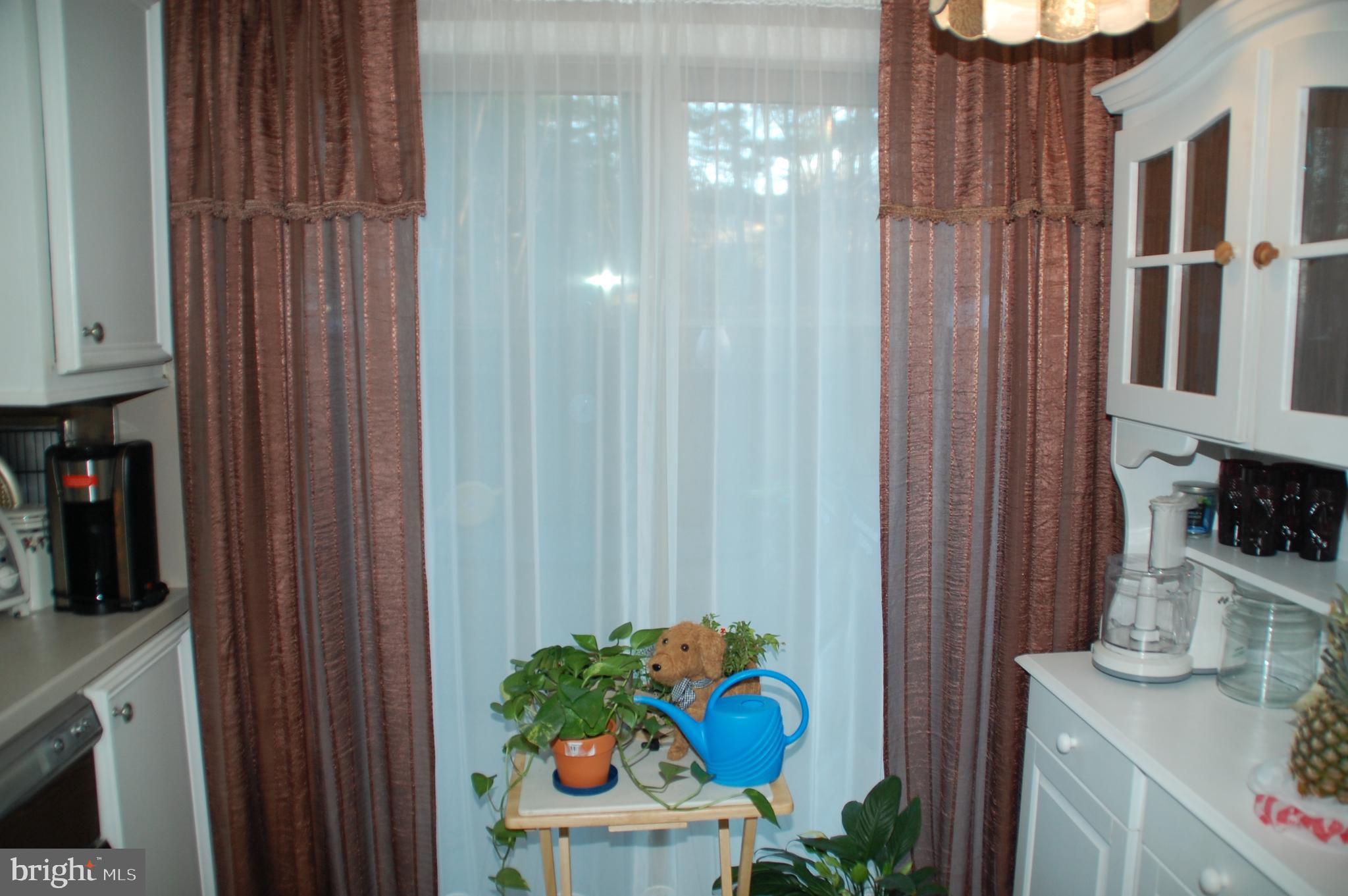 12 Centennial Road Telford, PA 18969 - Photo 7 of 35 and sliding glass doors to fenced Patio.