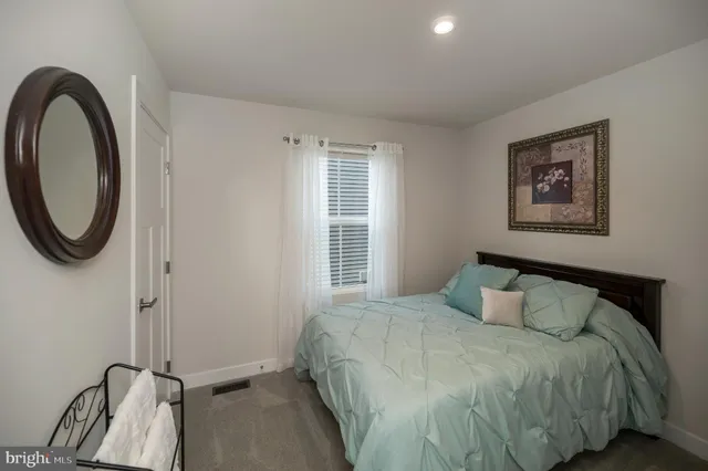 a bathroom with a shower curtain and a shower curtain