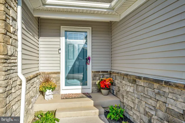 a view of a entryway door front of house