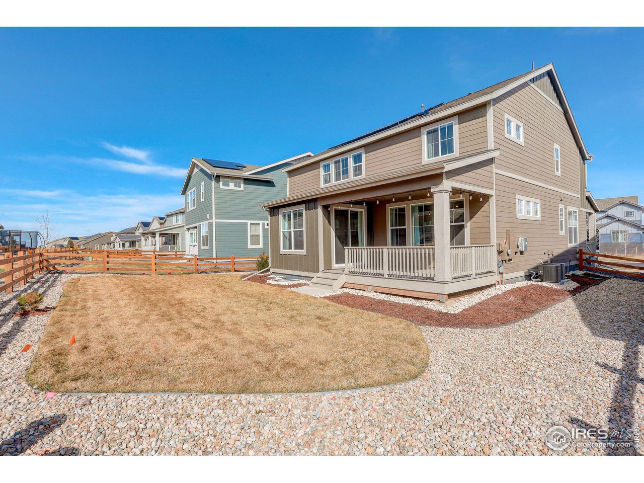 1881 Miranda Road Erie, CO 80516 - Photo 33 of 36 Covered deck looking over large backyard